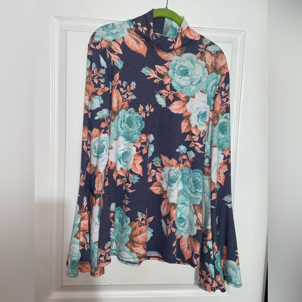 Acting Pro xl. Beautiful brand new/no tags, long bell sleeves shirts.